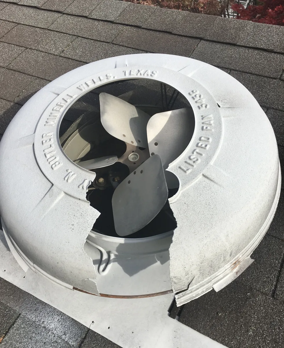 Attic fan housing destroyed by an animal